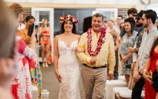 a father's and his daughter walking down a aisle. father's day catering; boardwalk catering; catering for father's day; cater father's day; home catering; caterer;