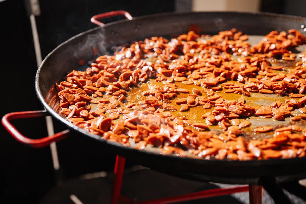 a large pan with food on it; paella pan; father's day catering